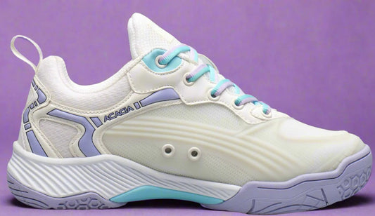 Dreanshot white and light blue pickleball shoe on a purple background