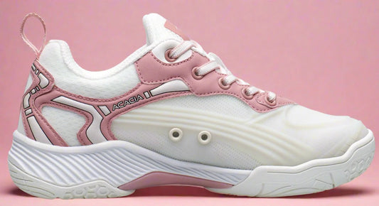 Dreamshot white and pink pickleball shoe on a pink background