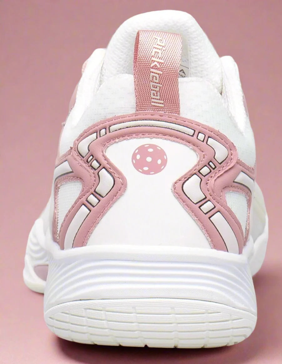 Dreamshot white and pink pickleball shoe on a pink background