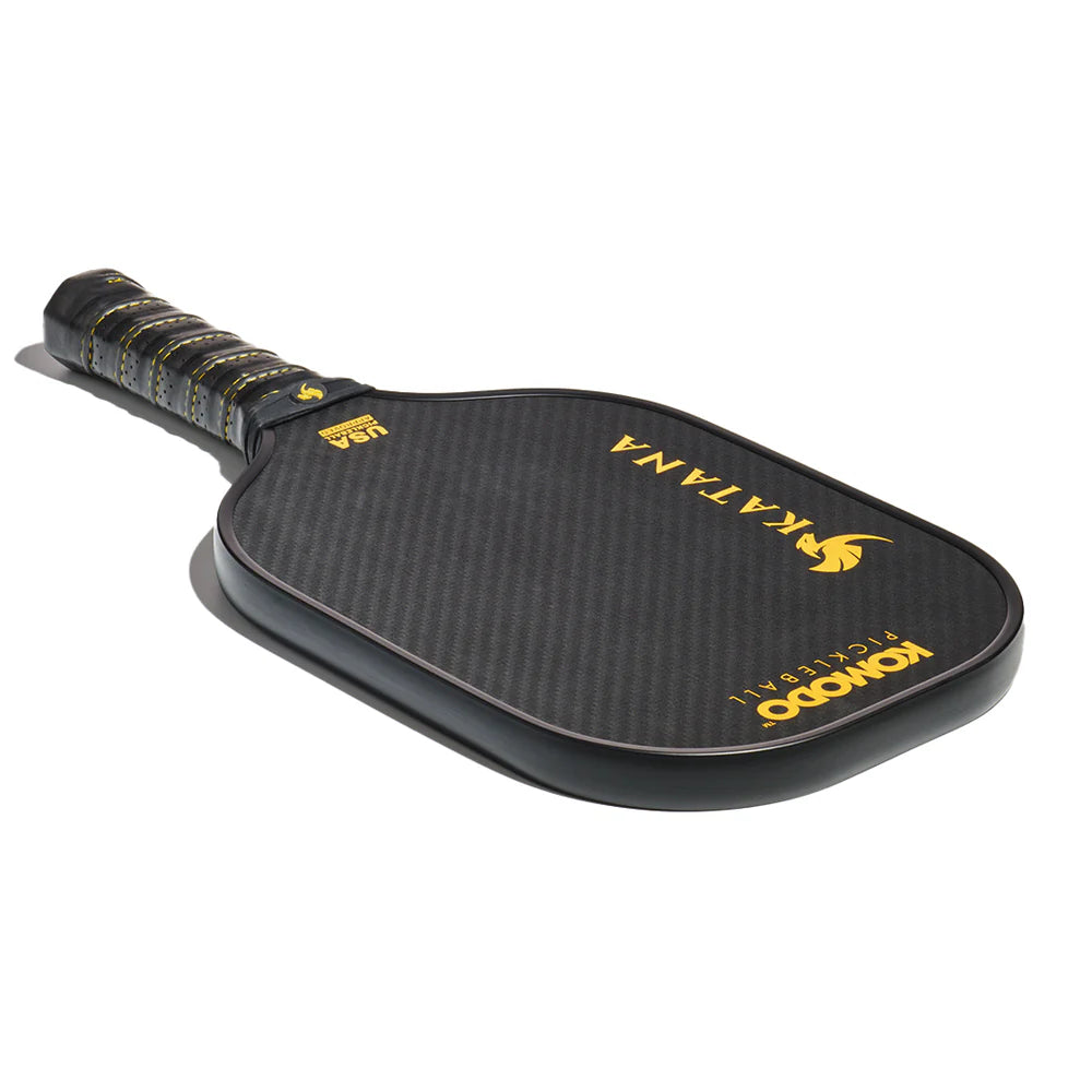 Pickleball paddle with 'Komodo' and 'Katana' G2 branding on a white background