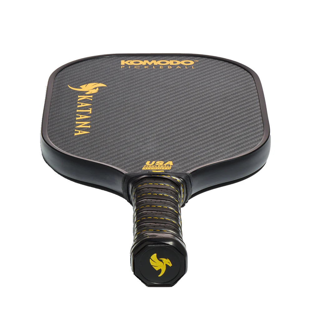 Pickleball paddle with 'Komodo' and 'Katana' G2 branding on a white background
