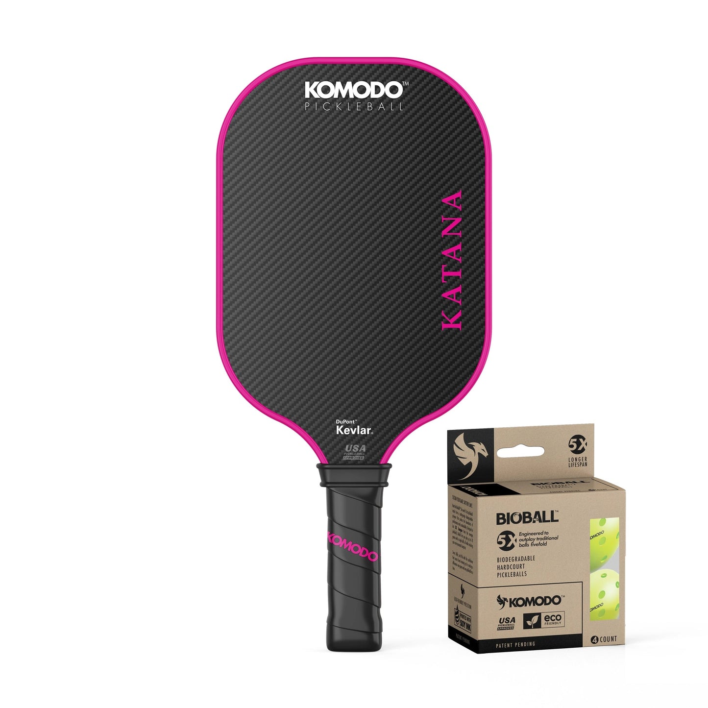 Black and pink pickleball paddle with 'Komodo' branding and 4 pack of Bioball pickleballs on a white background