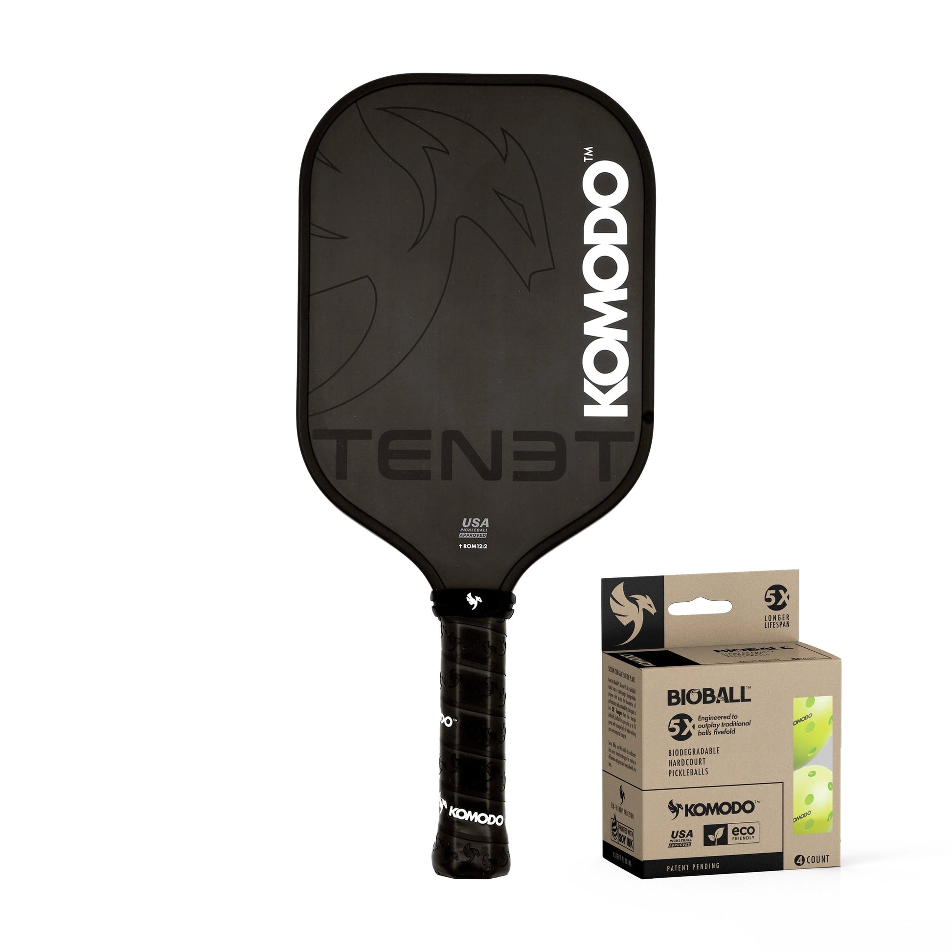 16mm Black Tenet pickleball paddle with 'Komodo' branding on a white background 4 pack Bioballs